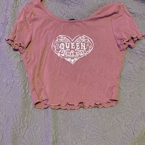 Pink crop top that says queen on it